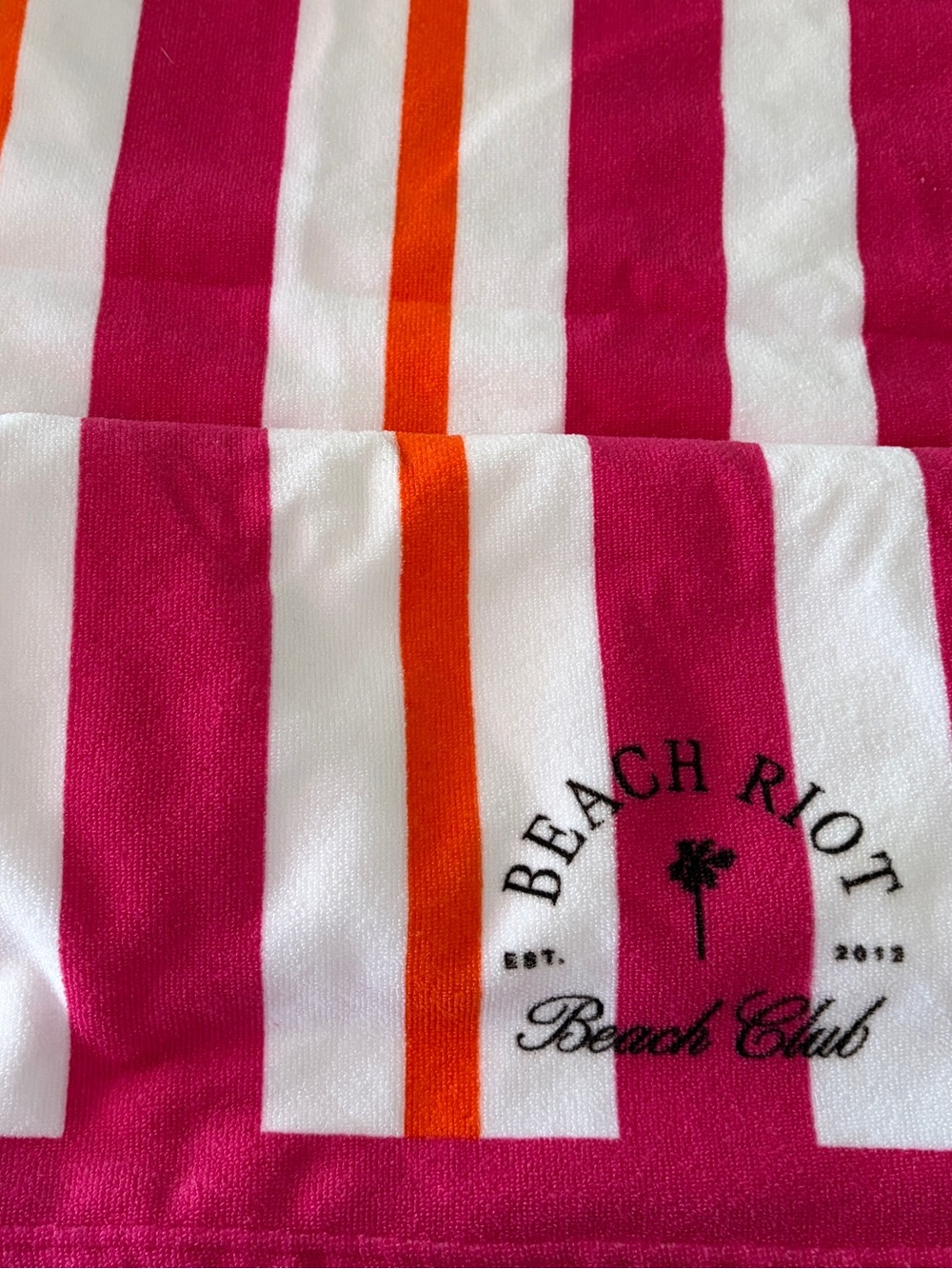 Beach Riot Pink and White Striped Towel with Orange Trim
